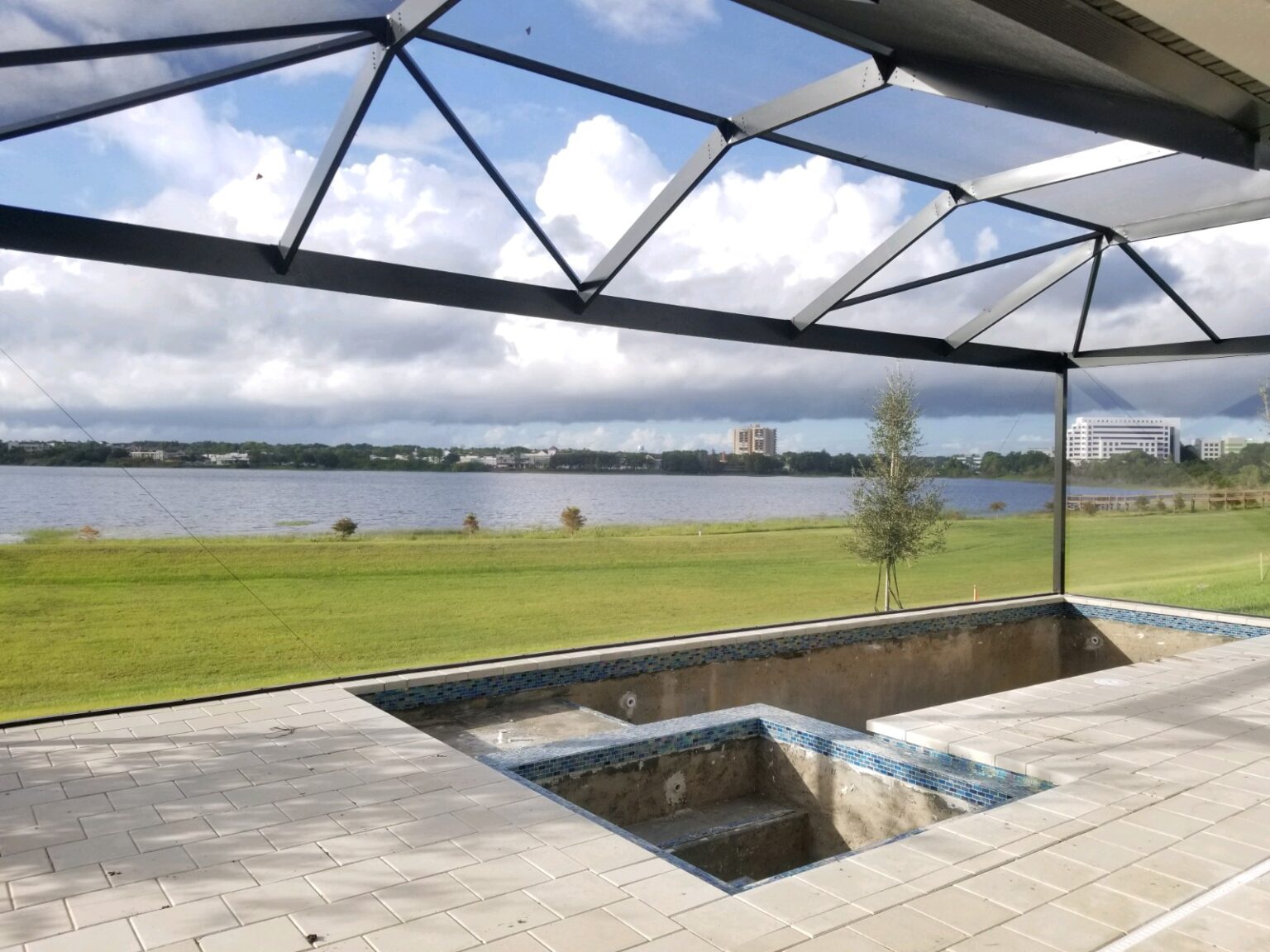 A view of the water from inside a house.